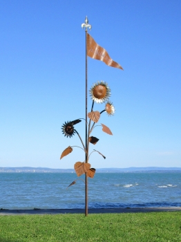 Garden sculpture welcome with sunflower